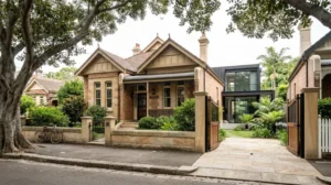 High-spec luxury home builders Sydney marble benchtop oak cabinetry bifold doors pool